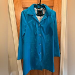 Ladies turquoise lined rain jacket with with removable hood by relativity